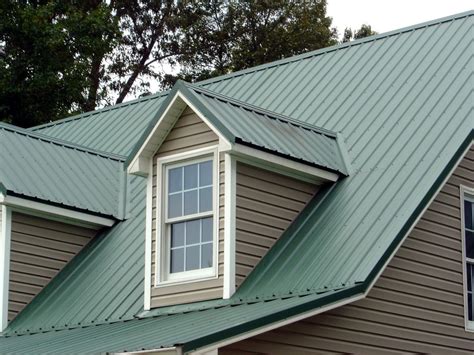 green metal roof on tan house|standing seam metal roofing colors.